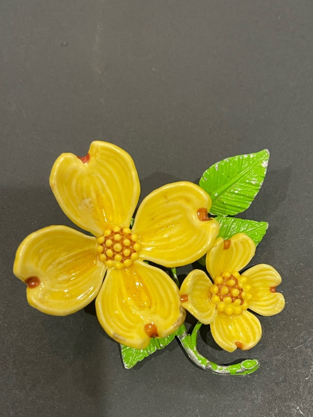 Yellow Enamel Flower Brooch with Green Leaves